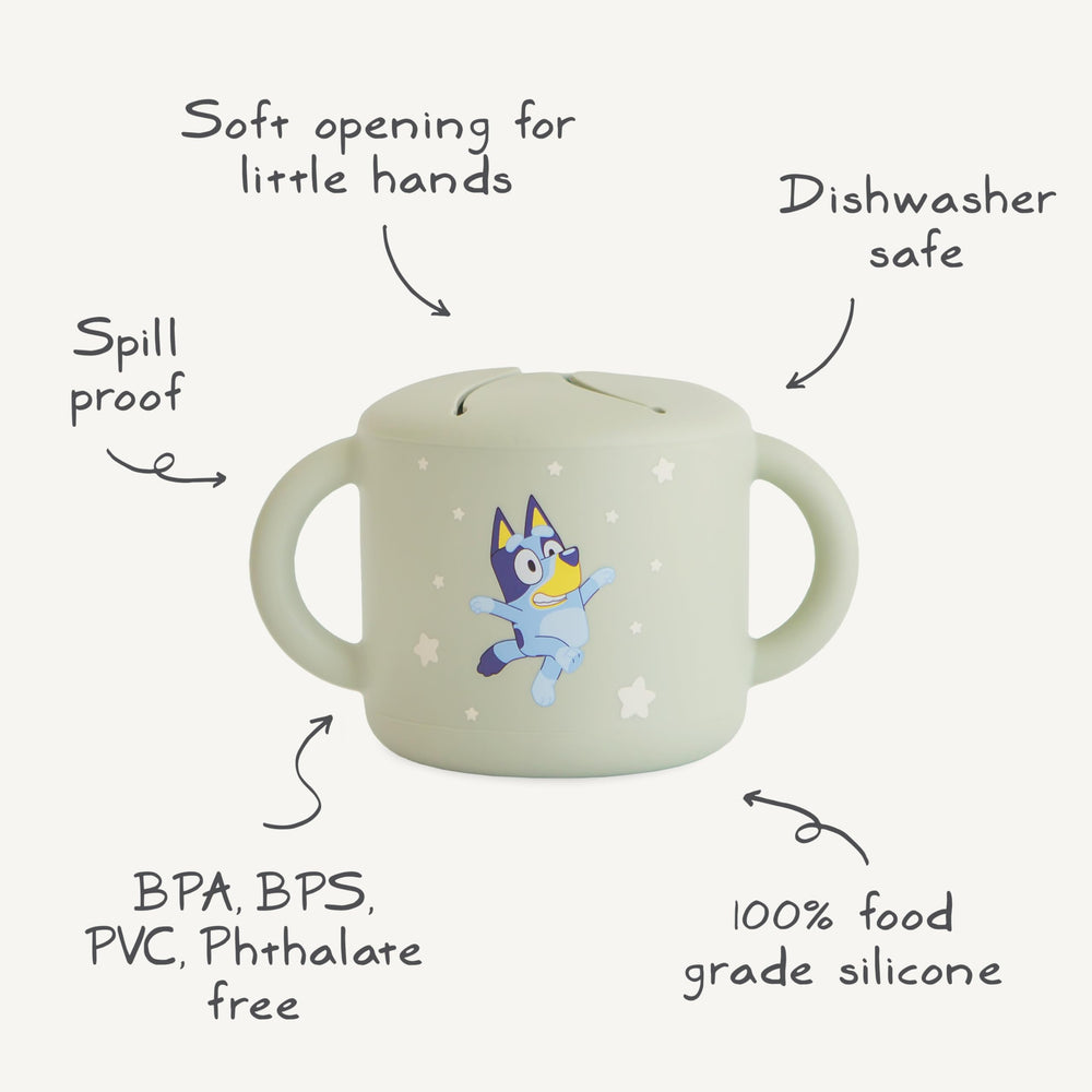 Mushie Bluey silicone snack cup for baby feeding and self-feeding practice.