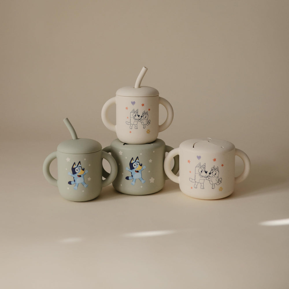 Mushie Bluey cup built for on-the-go feeding with kid-friendly grip.