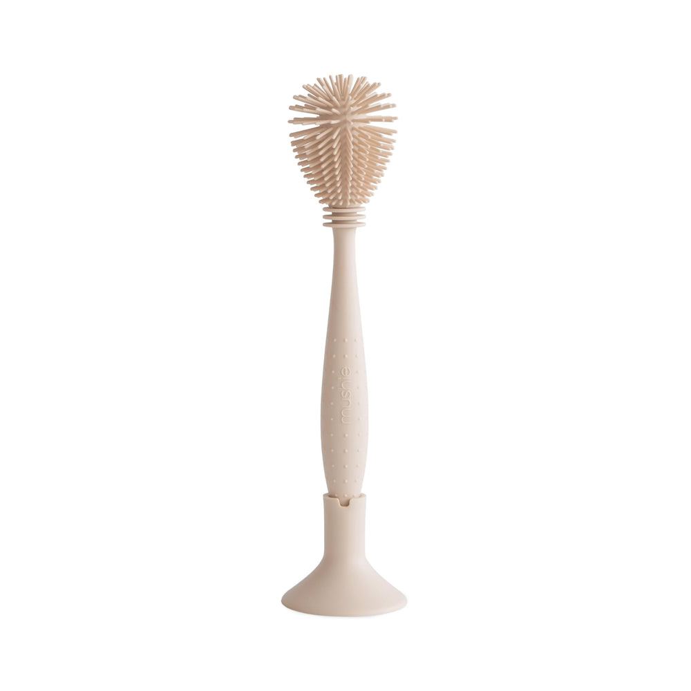 Mushie bottle brush silicone head for bottle interiors, gentle cleaning.