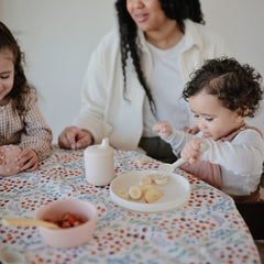 Mushie BPA-free silicone plate shows safe, easy-to-clean surface for families.