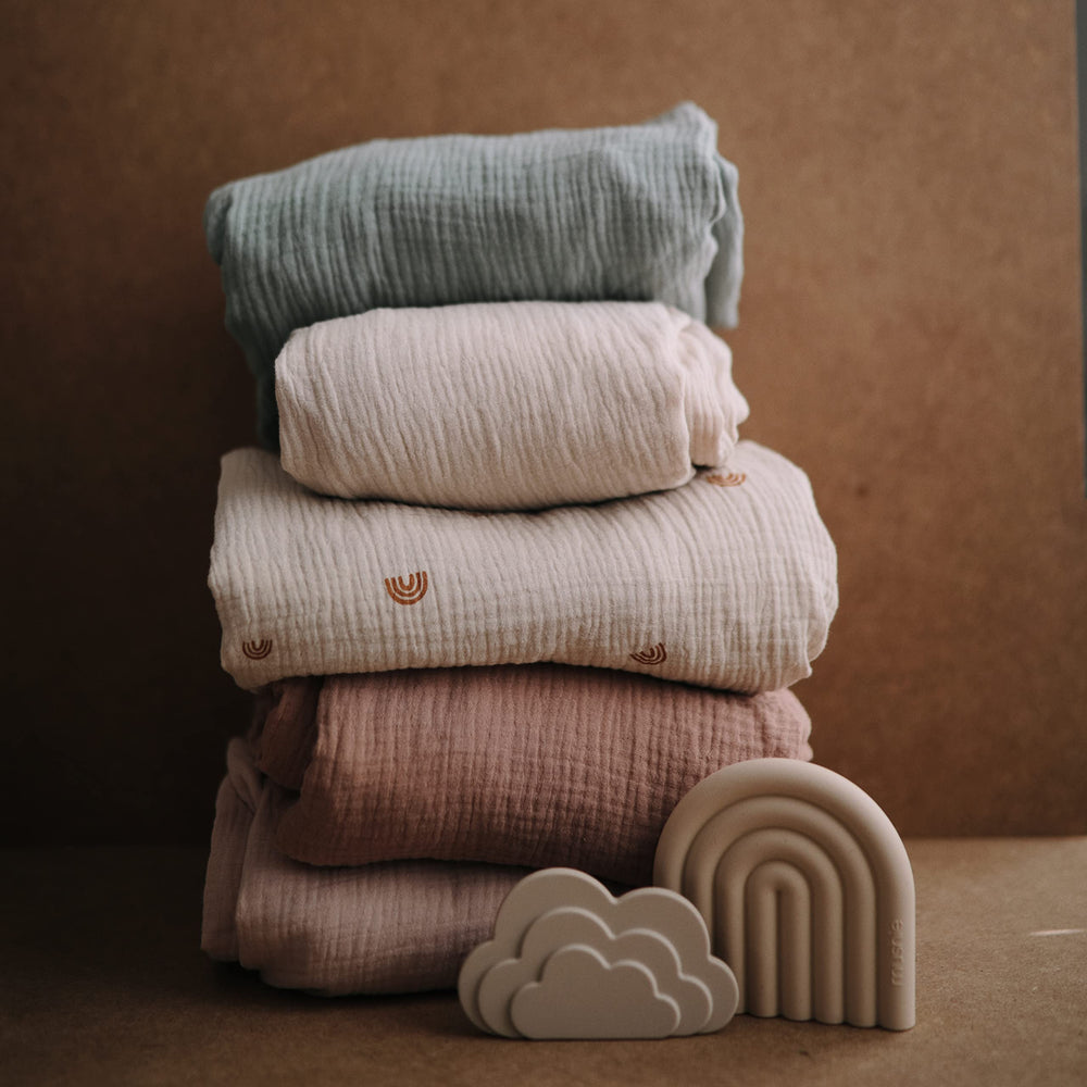 Mushie breathable muslin crib sheet detail emphasizing airflow and comfort