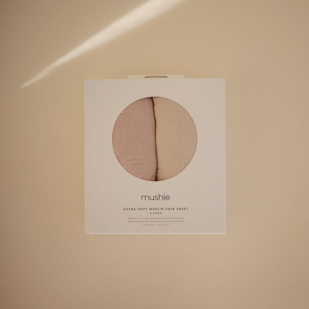 Mushie breathable muslin sheet keeps baby comfortable and warm.