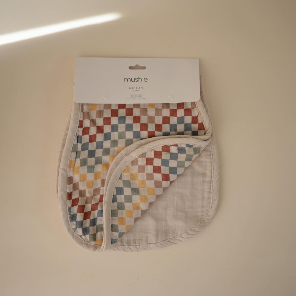 Mushie burp cloth absorbent-muslin keeps spills contained for easy cleanup.