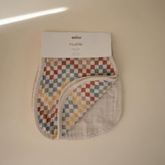 Mushie burp cloth absorbent-muslin keeps spills contained for easy cleanup.