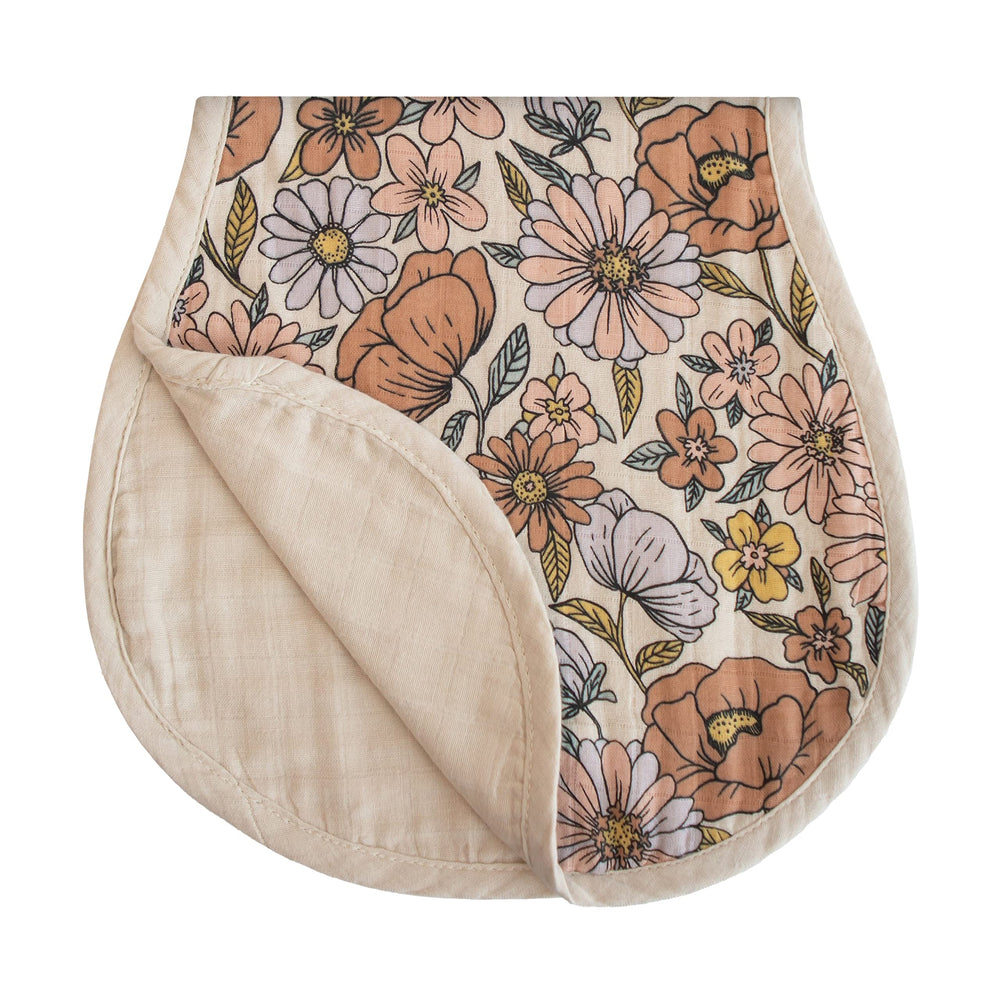 Mushie burp cloths retro-flowers folded; soft organic cotton for quick cleanups.