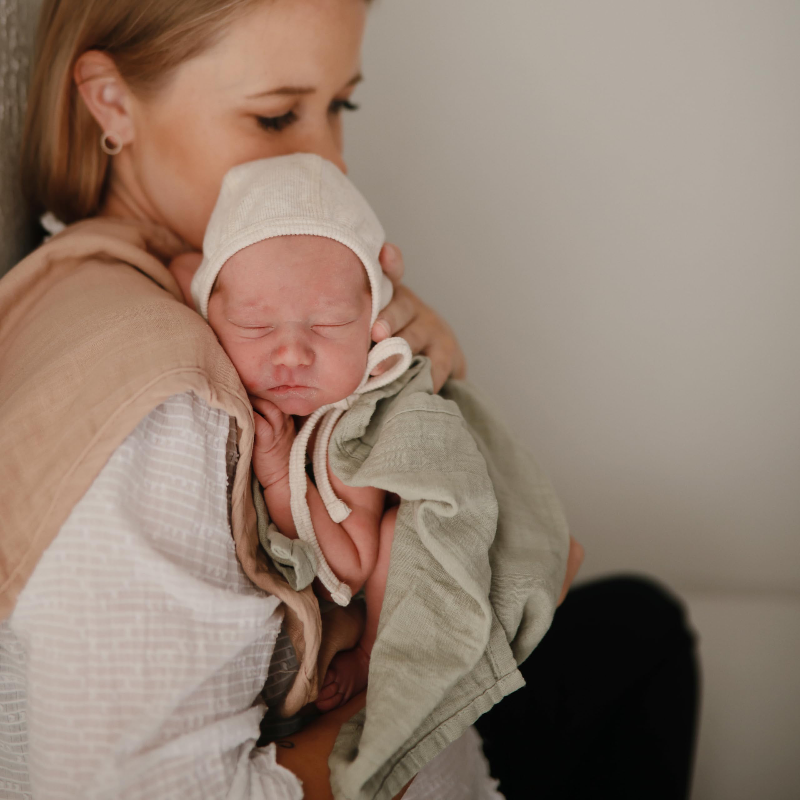 Mushie blush fog color palette image highlights neutral tones for baby outfits