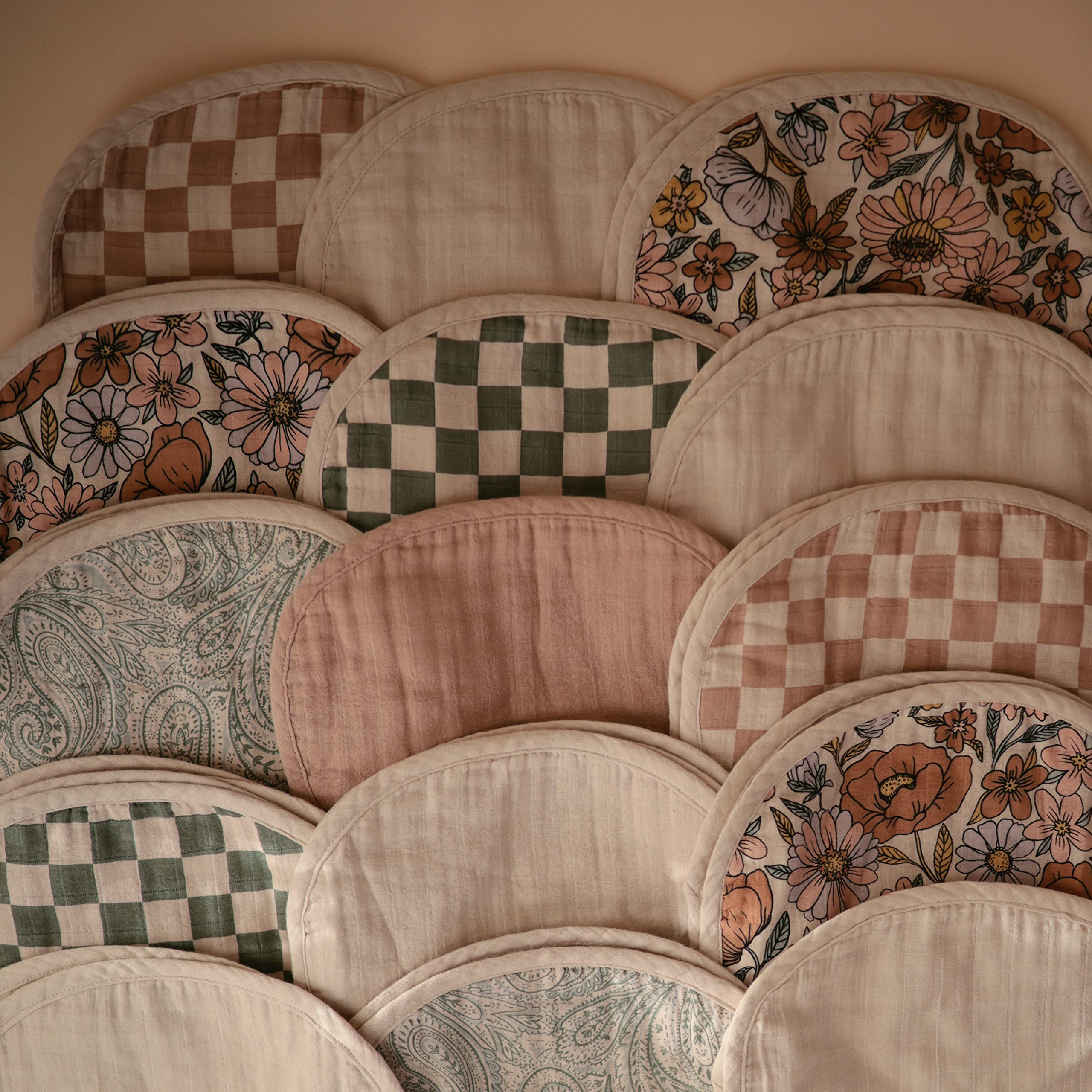 Mushie burp cloth close-up weave reveals breathable organic cotton texture and durability.
