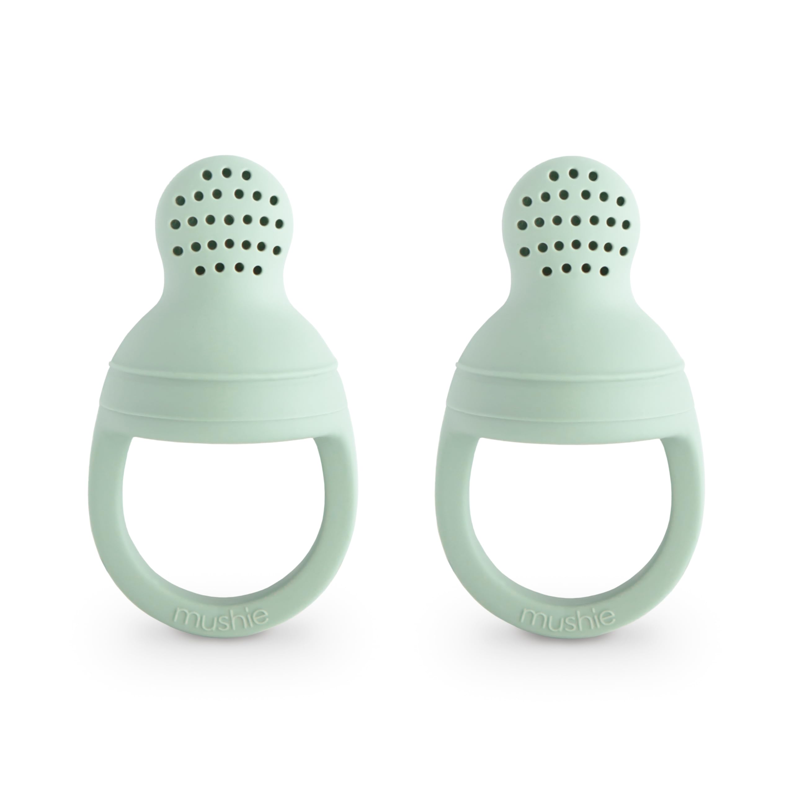 Mushie silicone baby feeder close-up shows soft material for safe, gentle feeding.