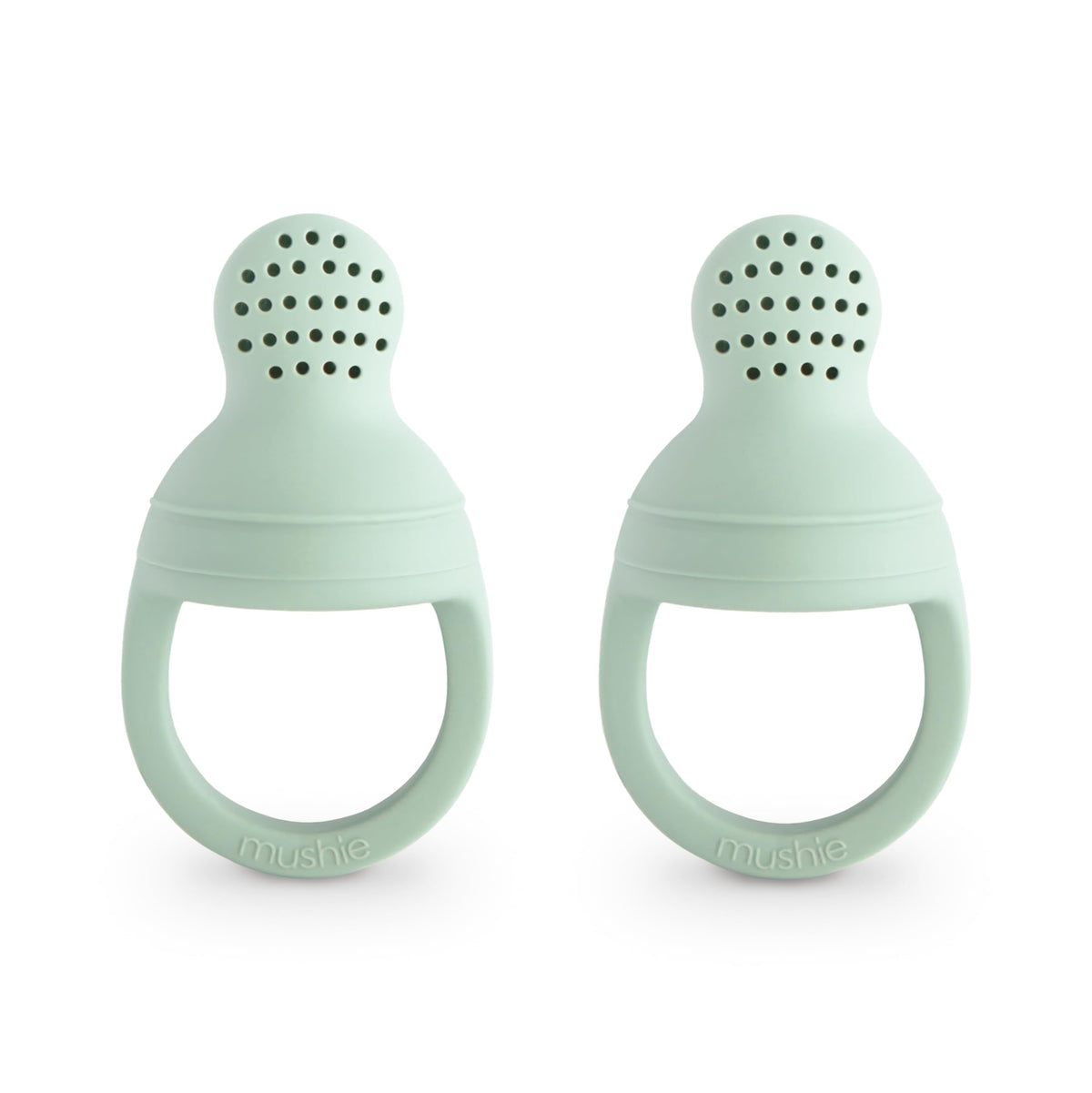 Mushie silicone baby feeder close-up shows soft material for safe, gentle feeding.
