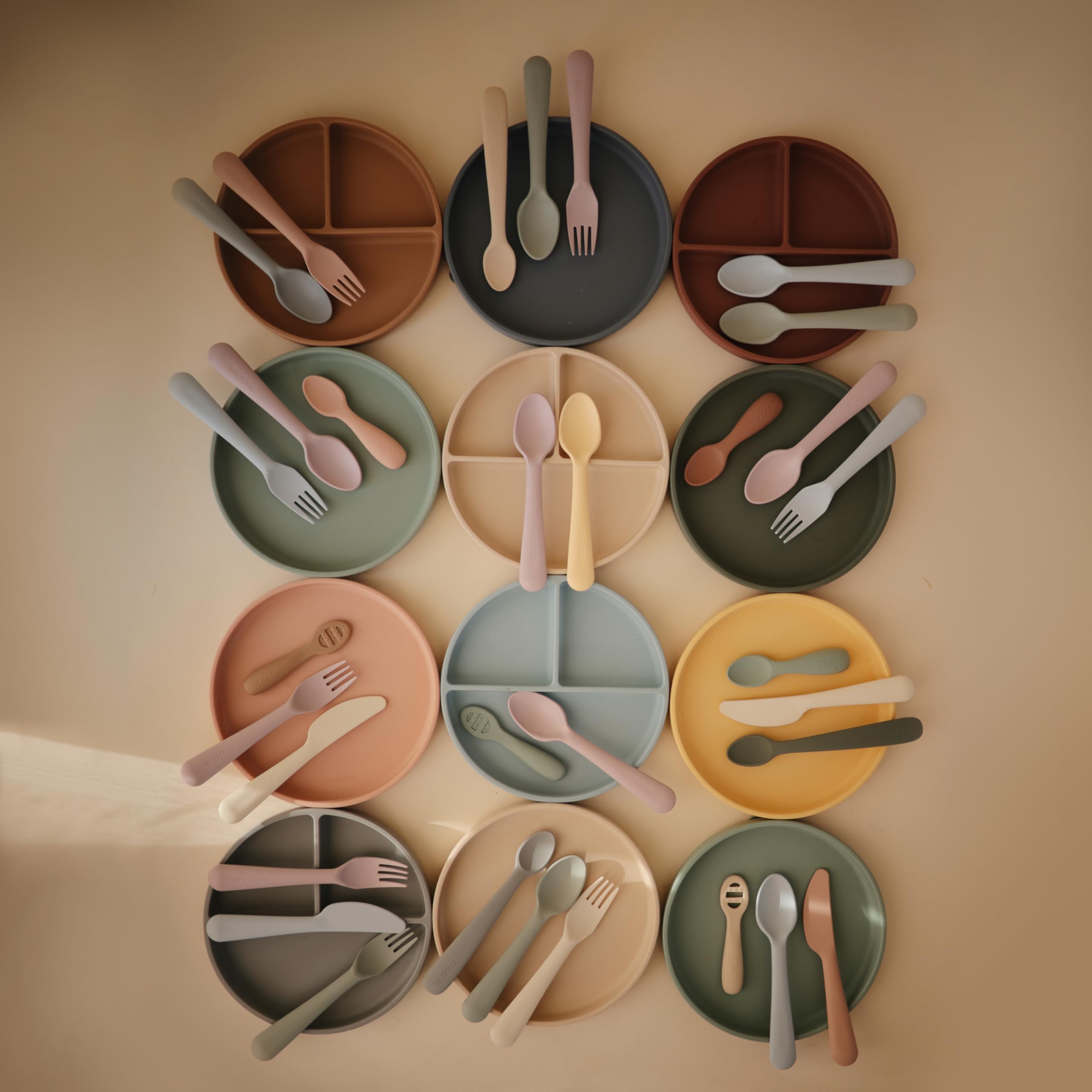 Mushie classic plate being held by child to show control