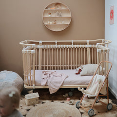 mushie crib sheet blush elastic edge ensures easy removal and secure fit after wash