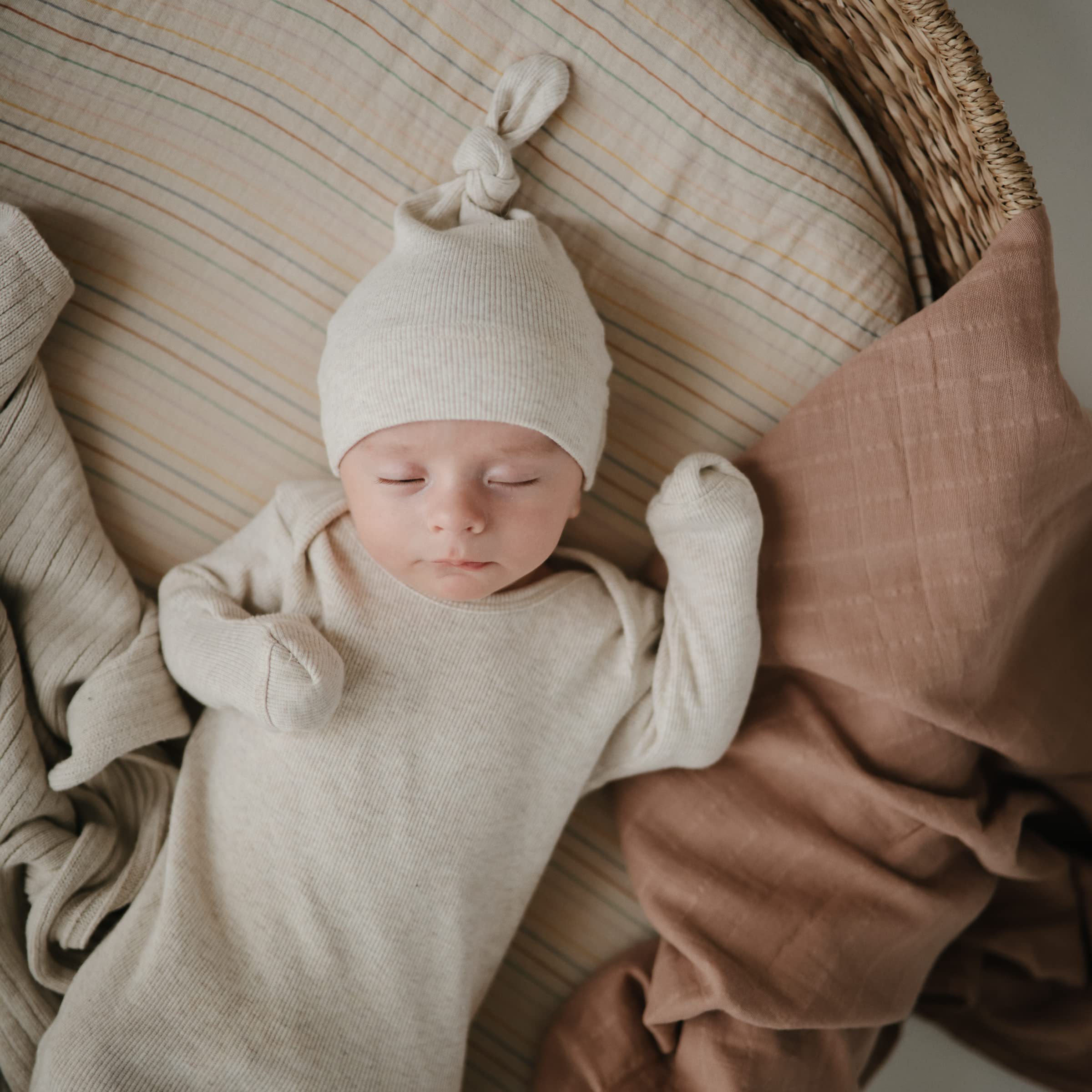Mushie crib sheet with elastic fit and deep pockets for a snug stay