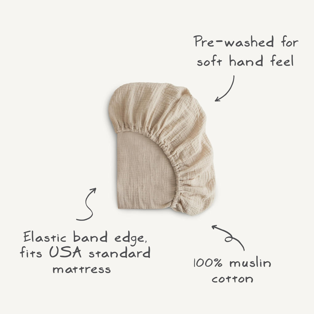 Mushie deep pockets keep sheet securely in place on mattress
