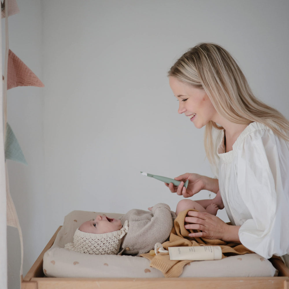 Mushie Diaper Cream Applicator uses food-grade silicone for safe handling
