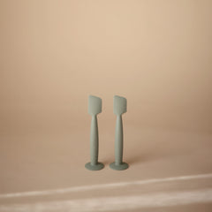 Close-up of Mushie applicator head showing soft silicone texture