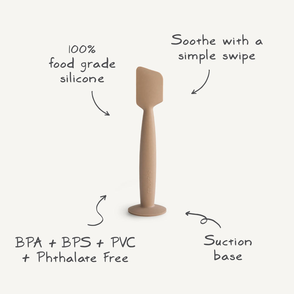 Natural packaging image of Mushie diaper cream applicator emphasizing safety and function.