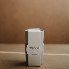 Mushie Sage cups front view highlights soft color and clean Danish styling.