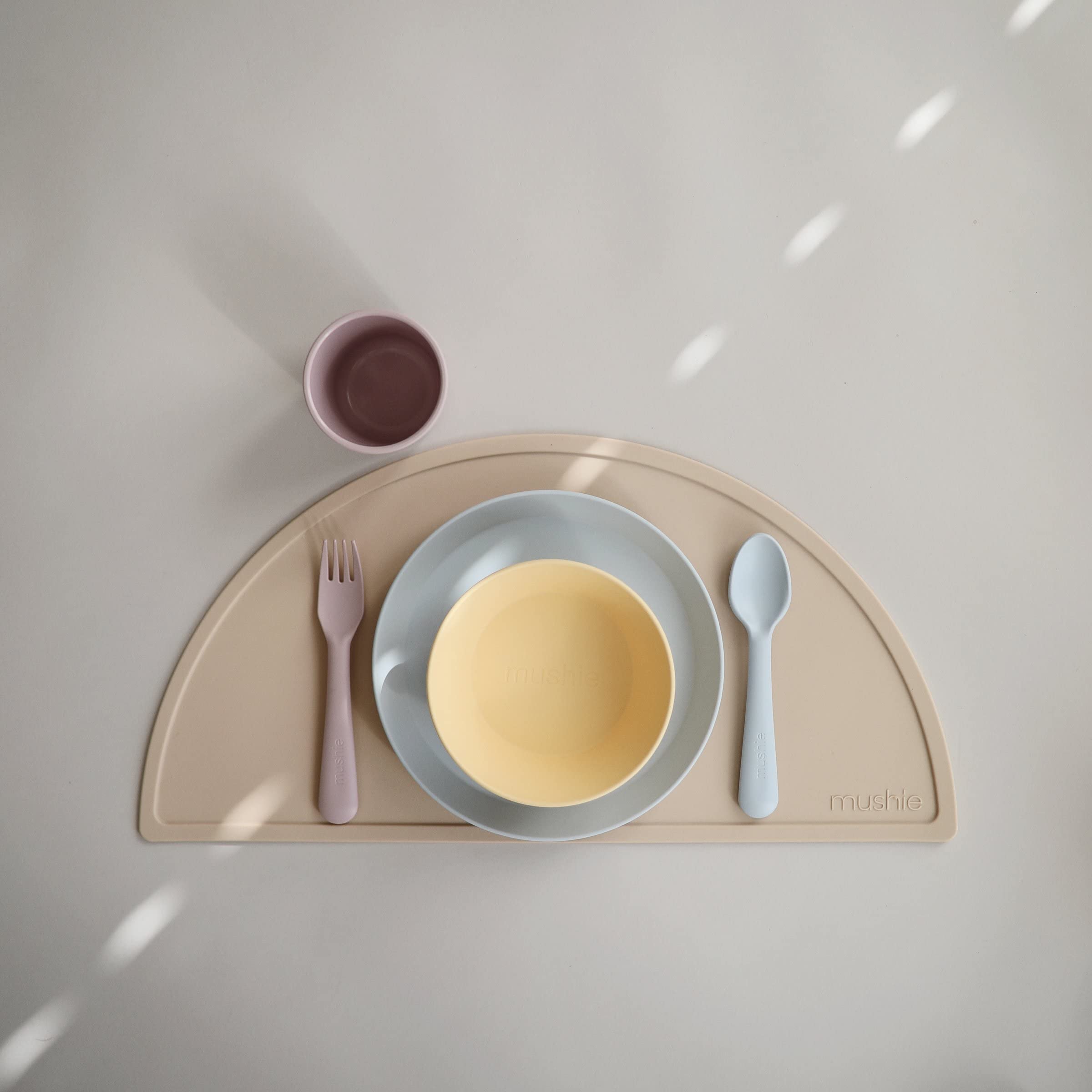 Mushie dinnerware cups side profile shows compact stackability for tidy shelves
