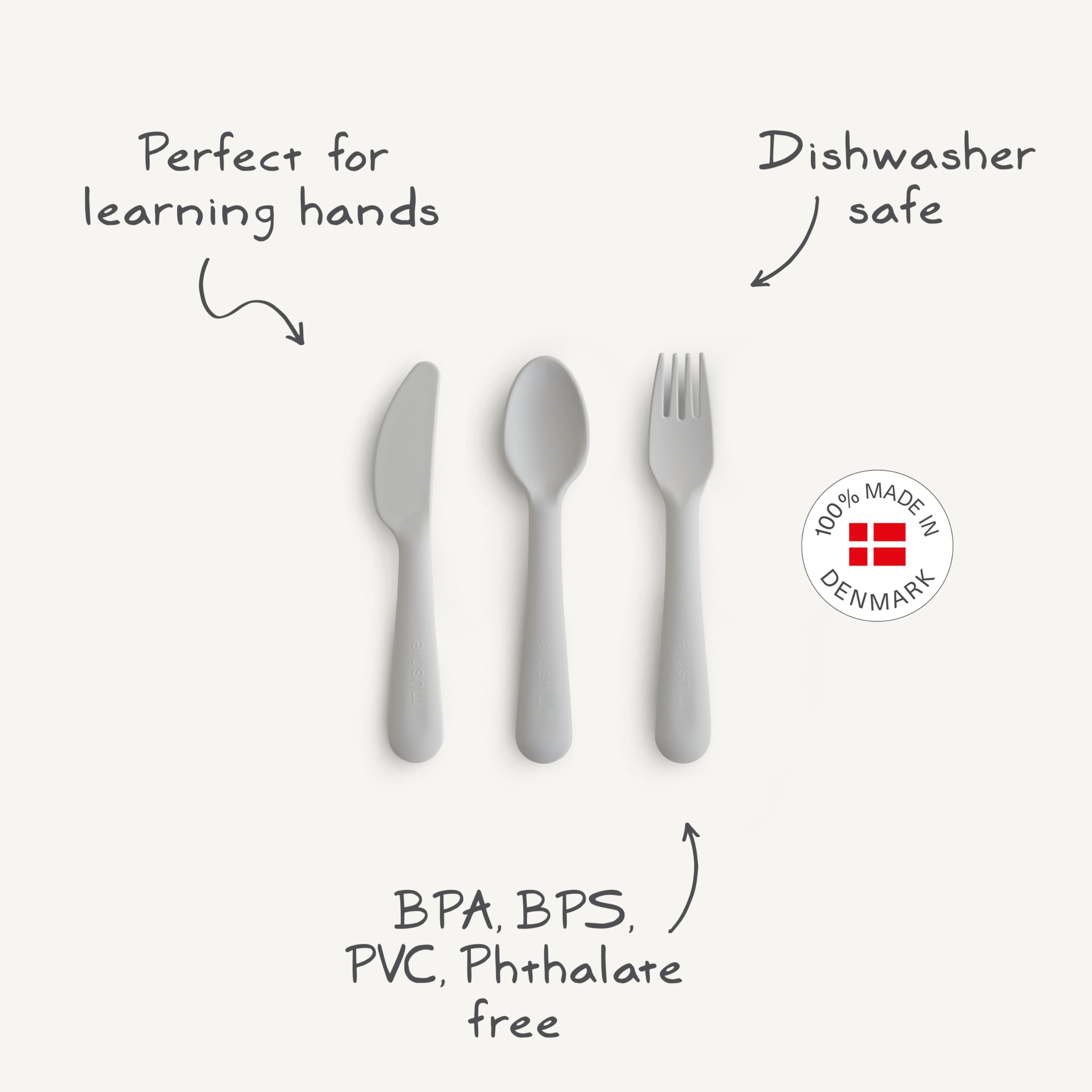 Mushie cutlery set sage spoon close-up highlights comfortable grip for toddler meals.