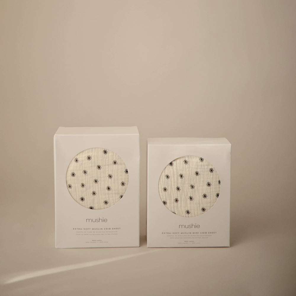 Mushie 52x28 fit crib sheet sized for standard mattress.