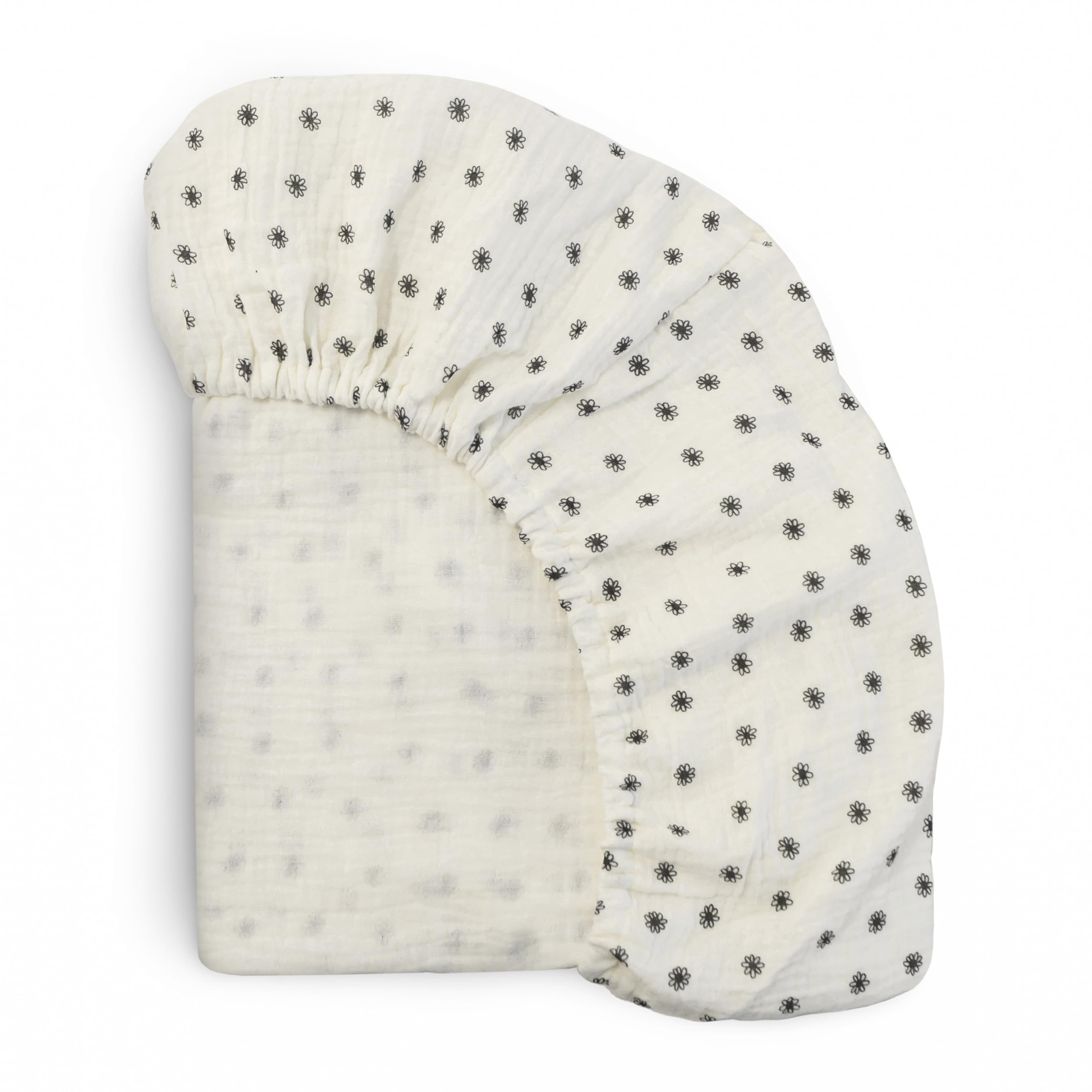 Mushie Extra-Soft Muslin Fitted Crib Sheet flatlay shows breathable cotton softness.