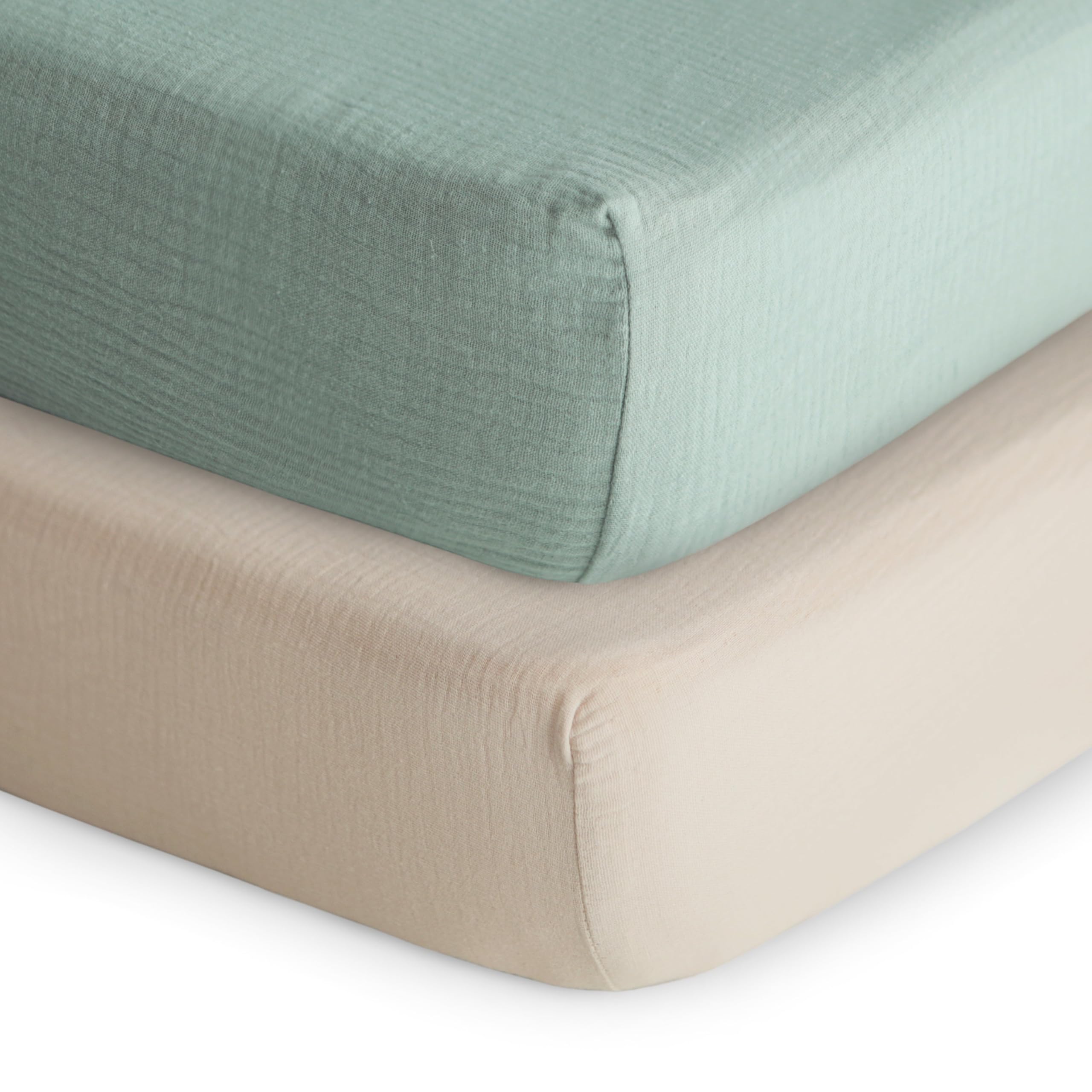 Mushie extra-soft muslin fitted crib sheet in Roman Green for gentle skin comfort.