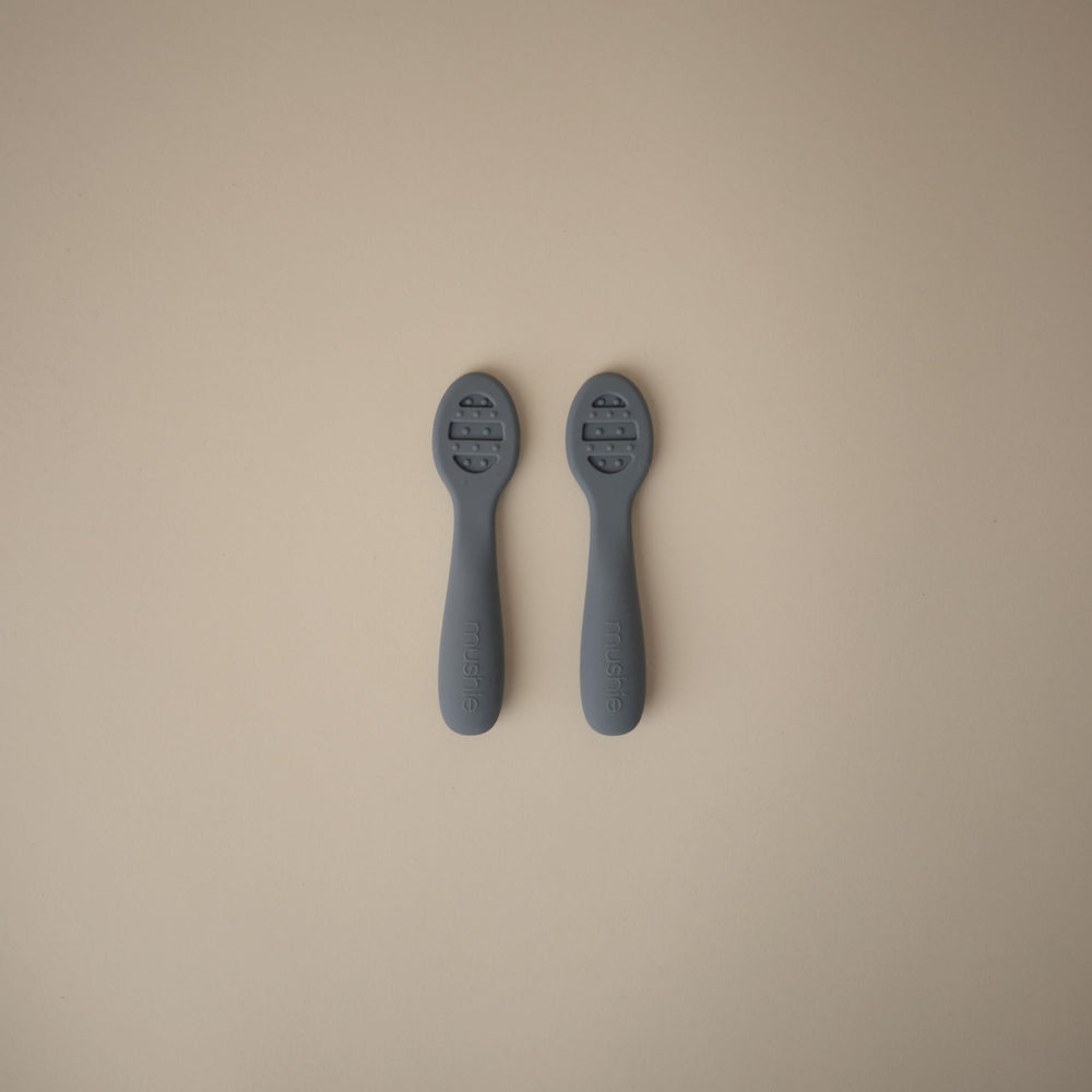 Mushie spoons with sensory dots aiding teething comfort