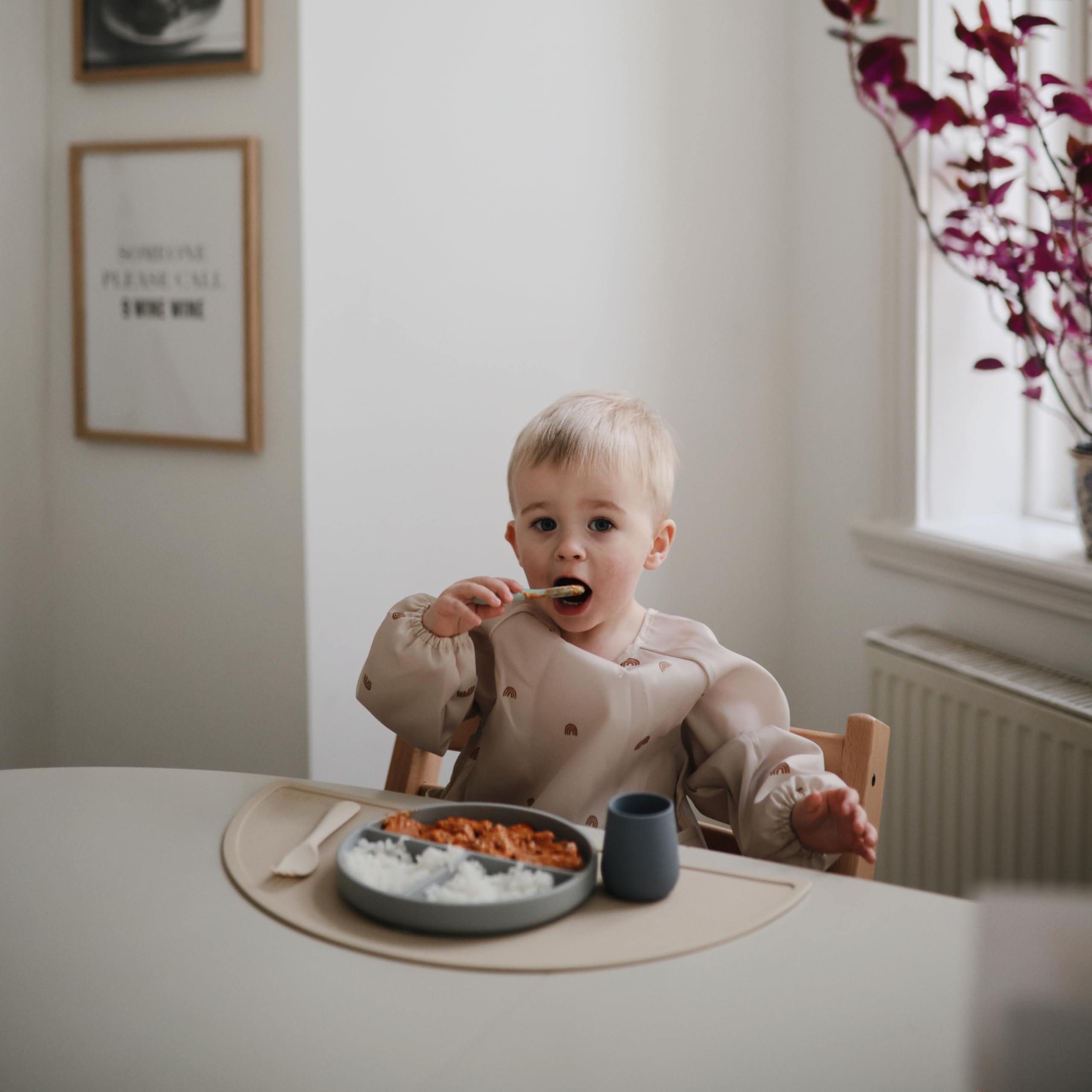 Mushie flat-design spoons for easy pickup by tiny hands