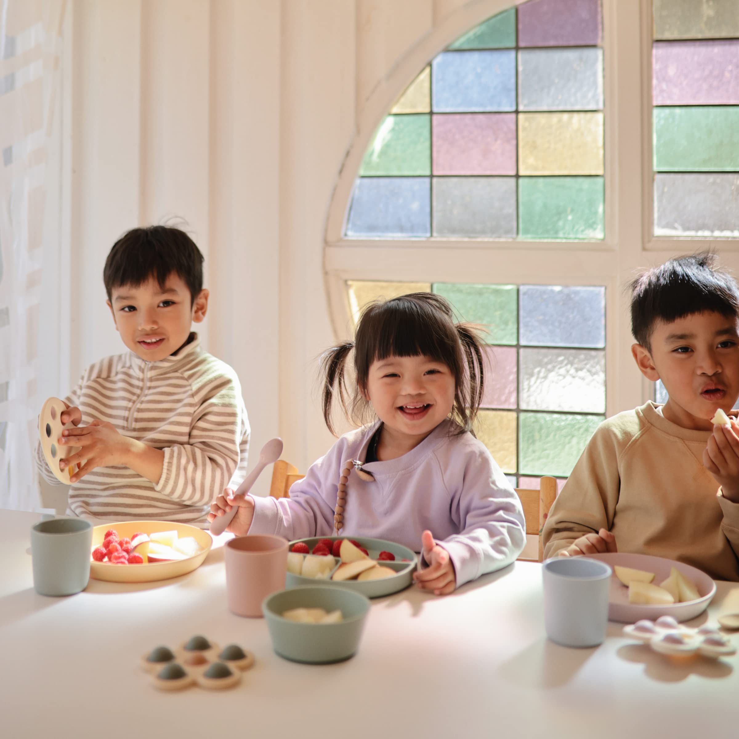 Mushie flatware child mealtime joy close-up highlighting durable construction.