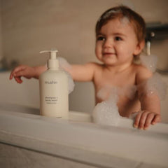 Mushie green lemon shampoo lather highlights soft cleaning for babies.