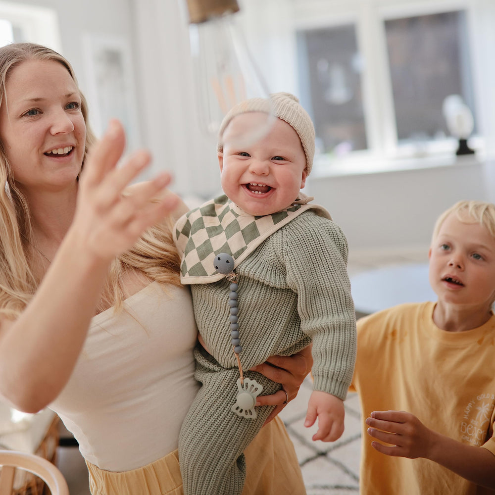 Mushie Hera eight-inch pacifier clip provides easy reach for caregivers