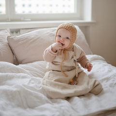 Mushie Hera pacifier clip soft color beads offer gentle tactile appeal and style.