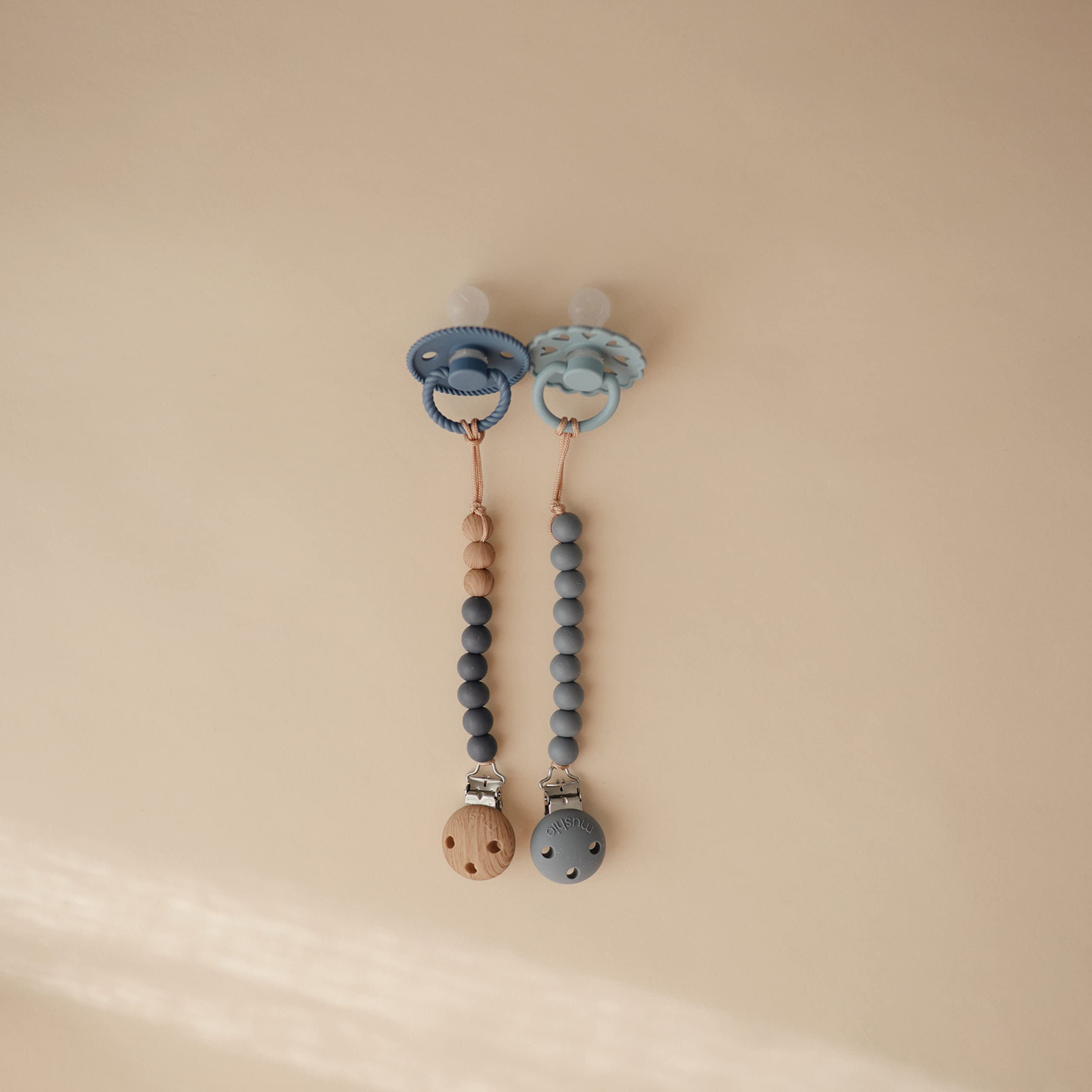 Mushie Hera silicone beads in soft colors for tactile soothing during daily routines