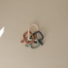 Mushie Key Toy lightweight ring fits tiny hands for easy grasp.