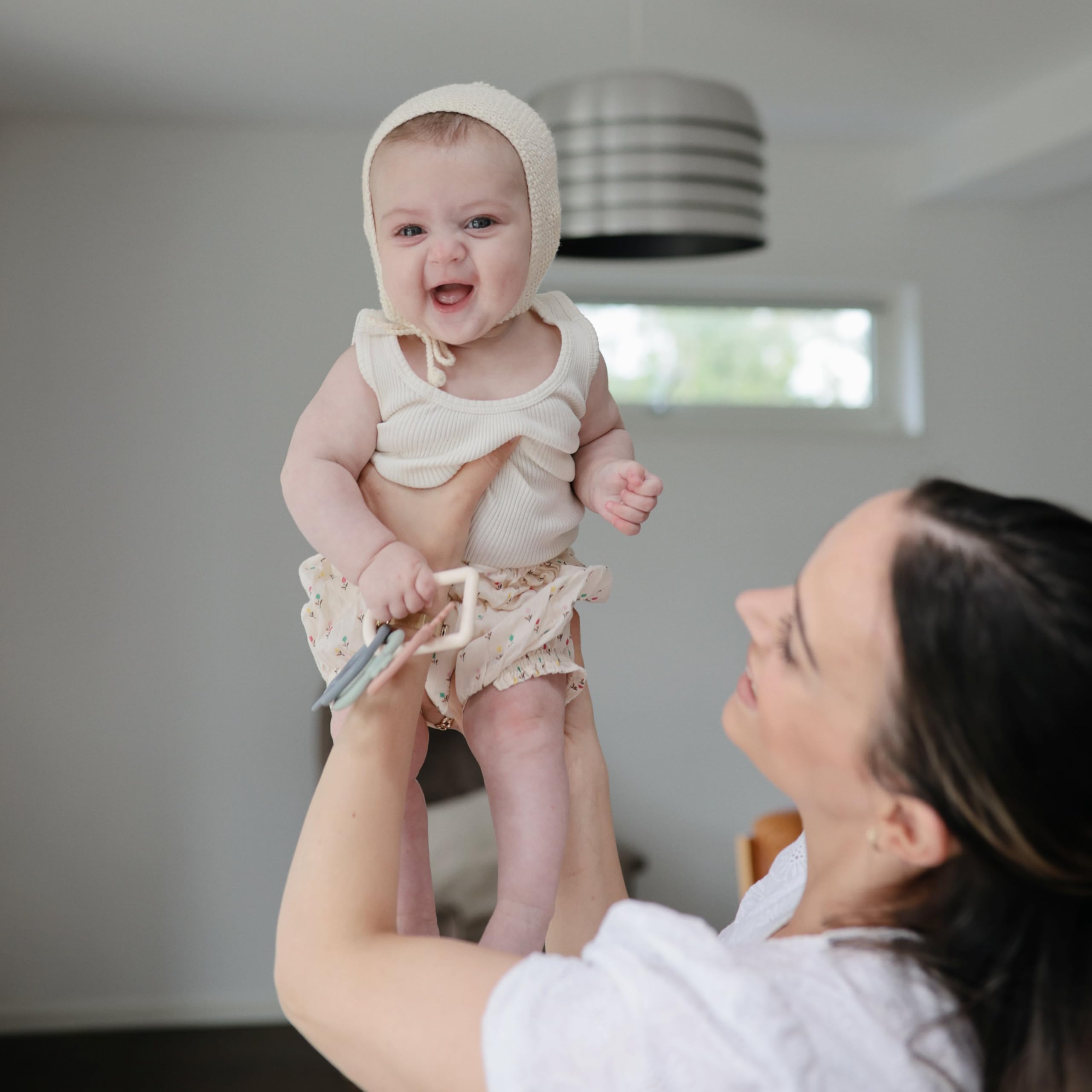 Mushie Key Toy uses non-toxic plastic safe for teething gums.