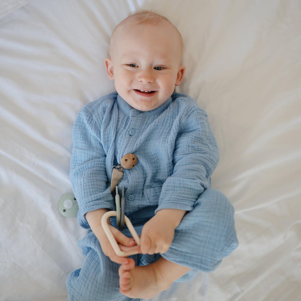 Mushie Key Toy demonstrates soft click-clack sounds during play.