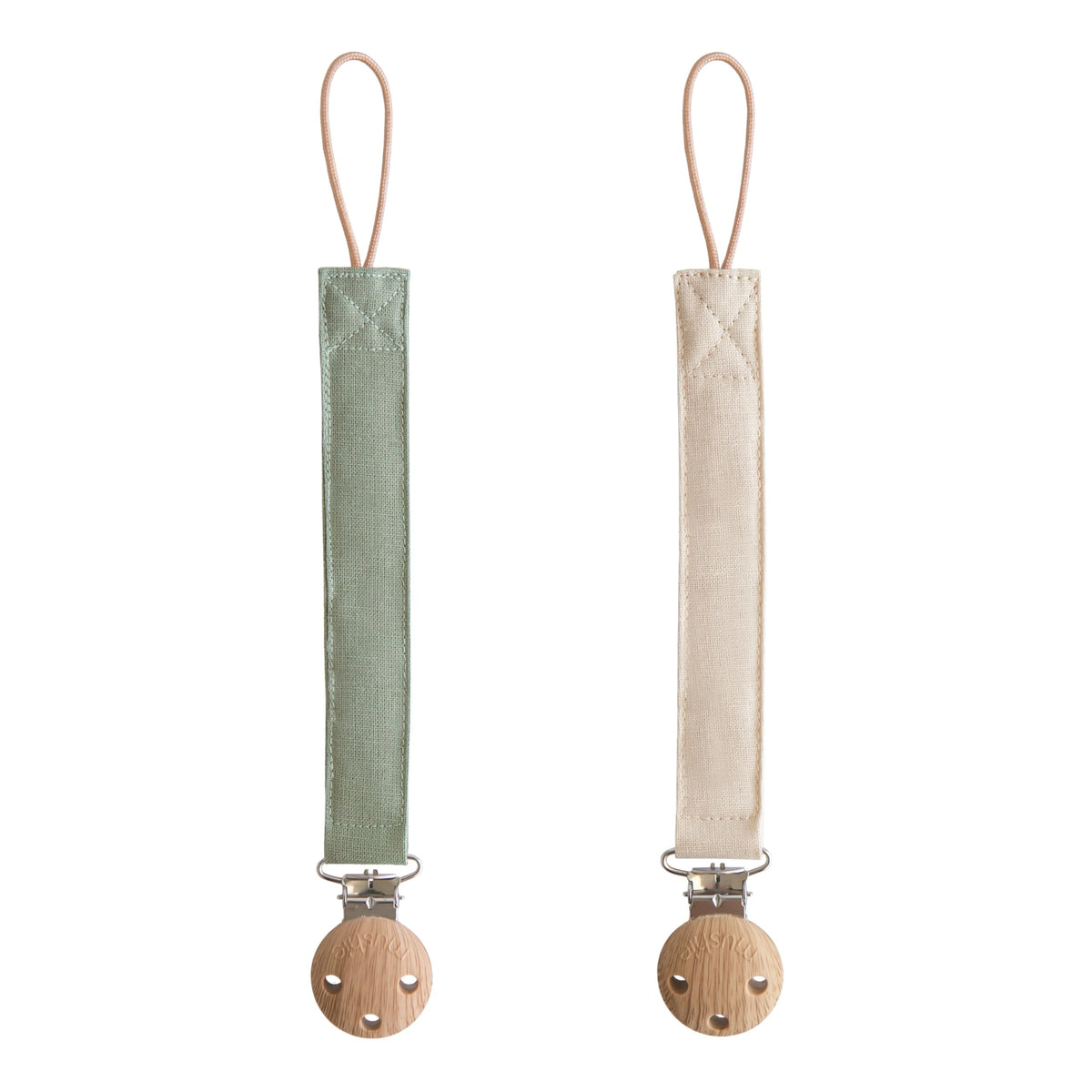 Mushie linen pacifier clip olive closeup with soft fabric for on-the-go comfort