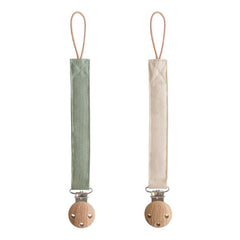 Mushie linen pacifier clip olive closeup with soft fabric for on-the-go comfort
