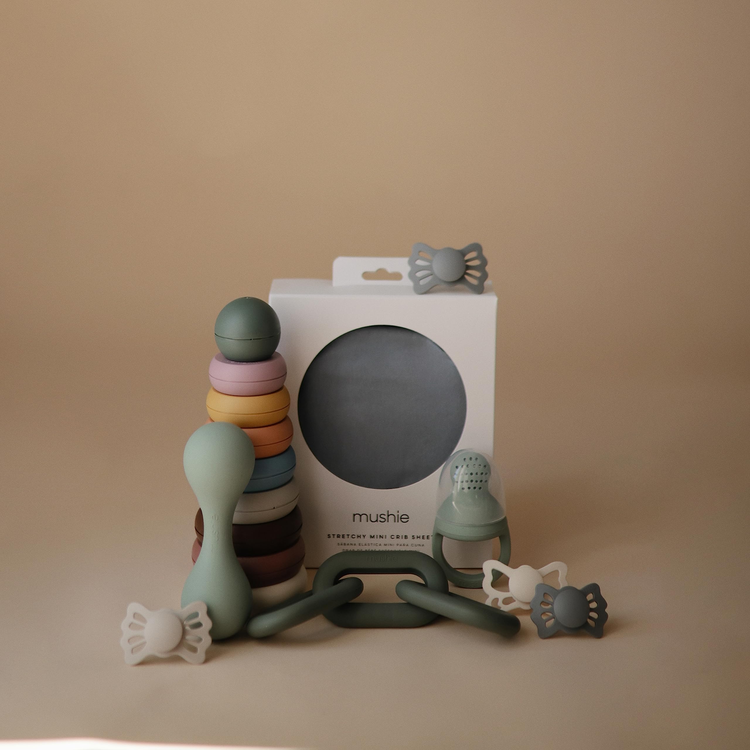 Mushie Links Teether cleaning-friendly silicone is easy to wash with warm soapy water.