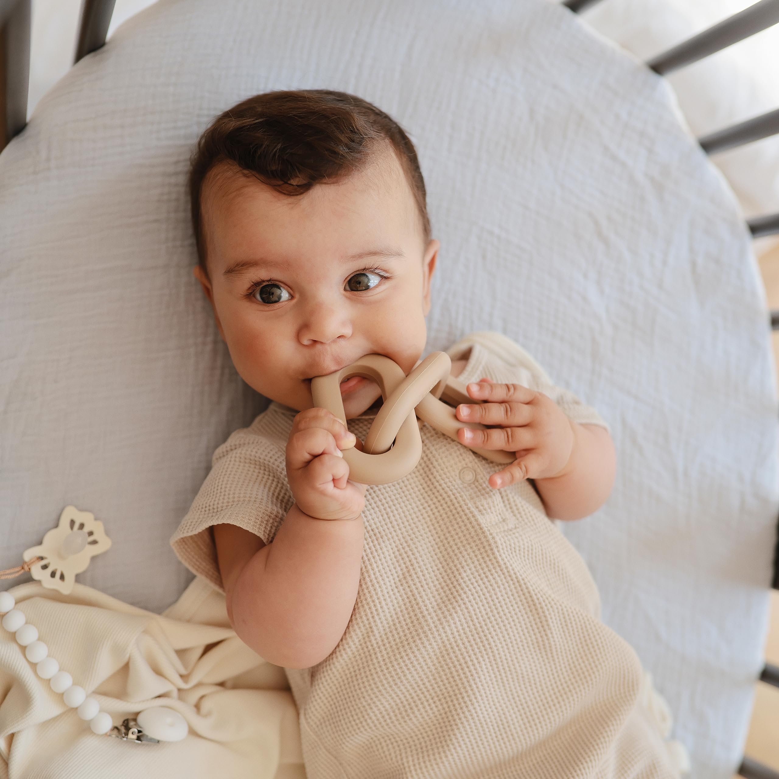 Mushie Links Teether packaging and presentation suitable for gifting to new parents.