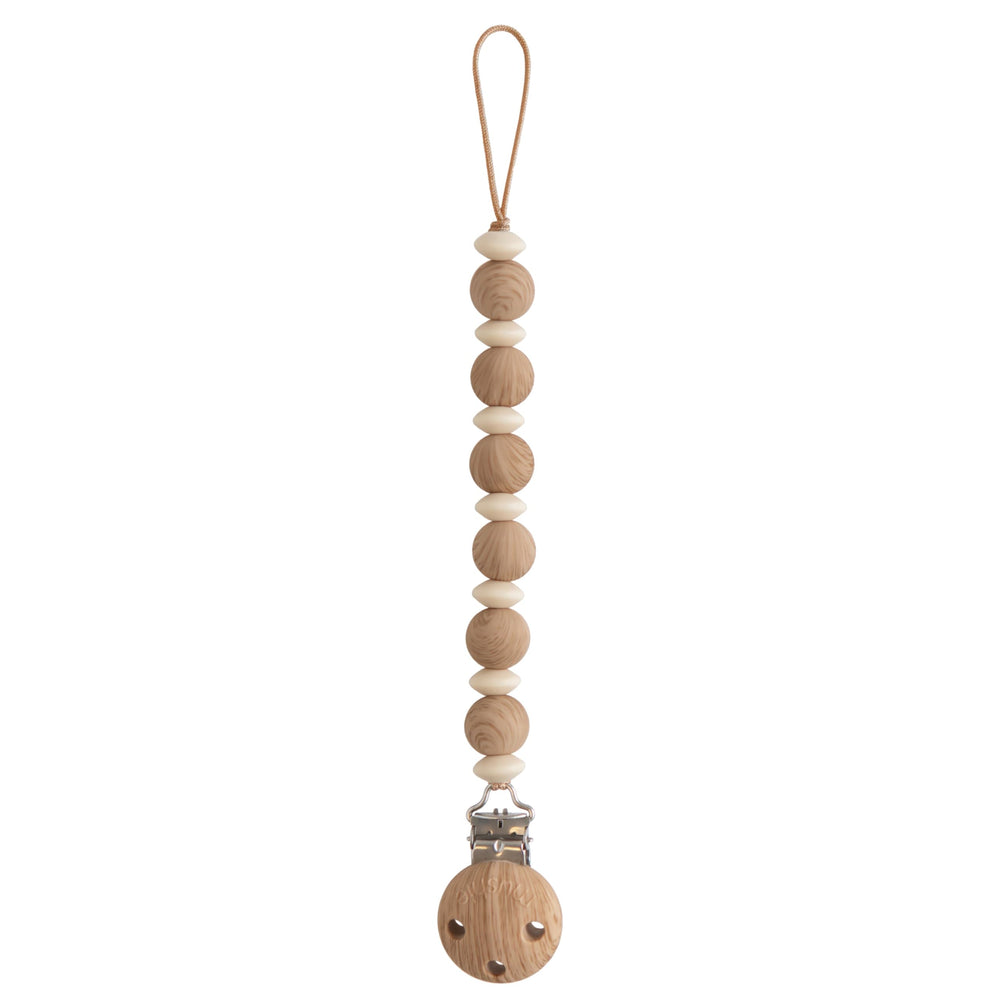 Mushie Luna silicone beads closeup shows safe, durable pacifier clip beads.