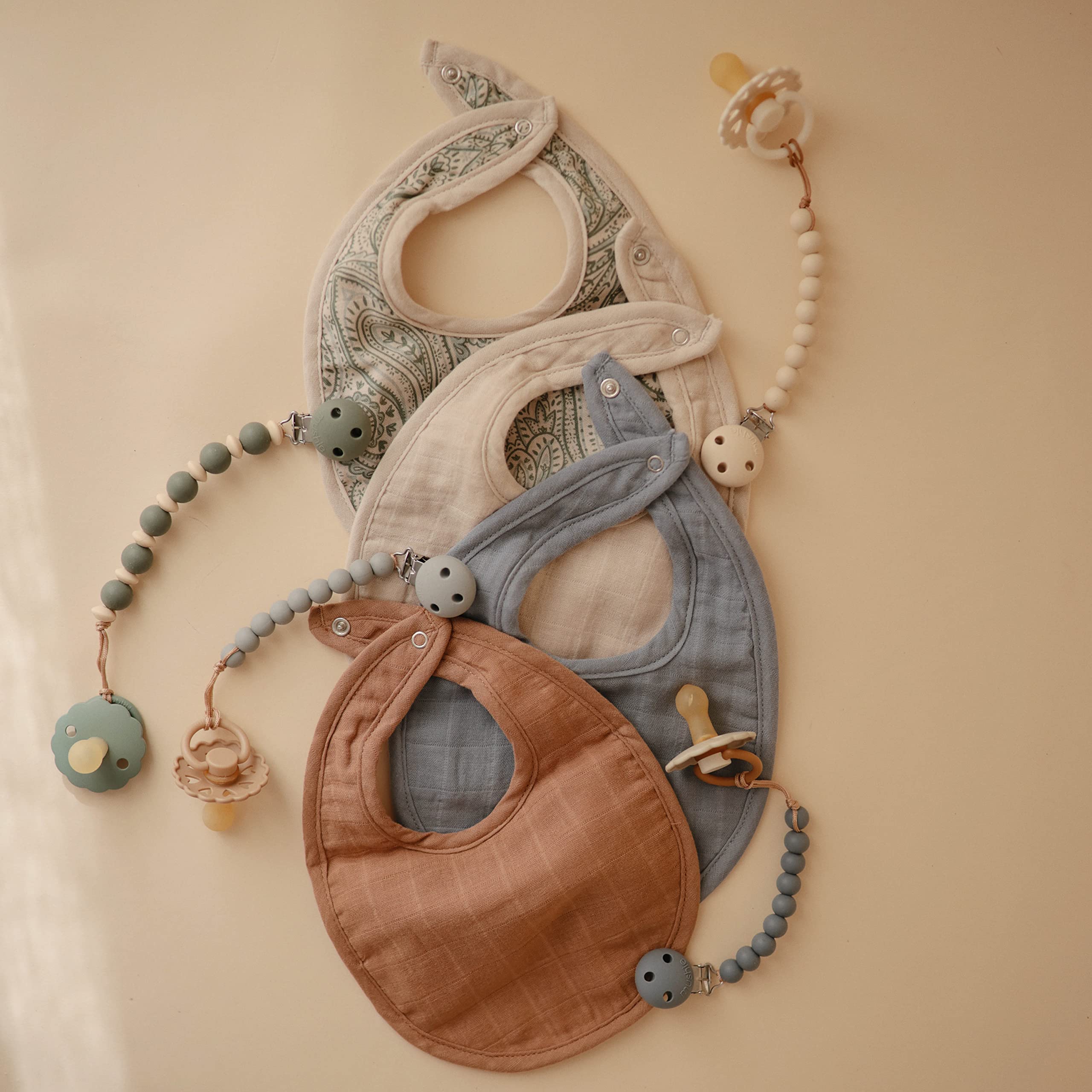 Mushie Muslin Bib organic cotton material offers gentle everyday comfort