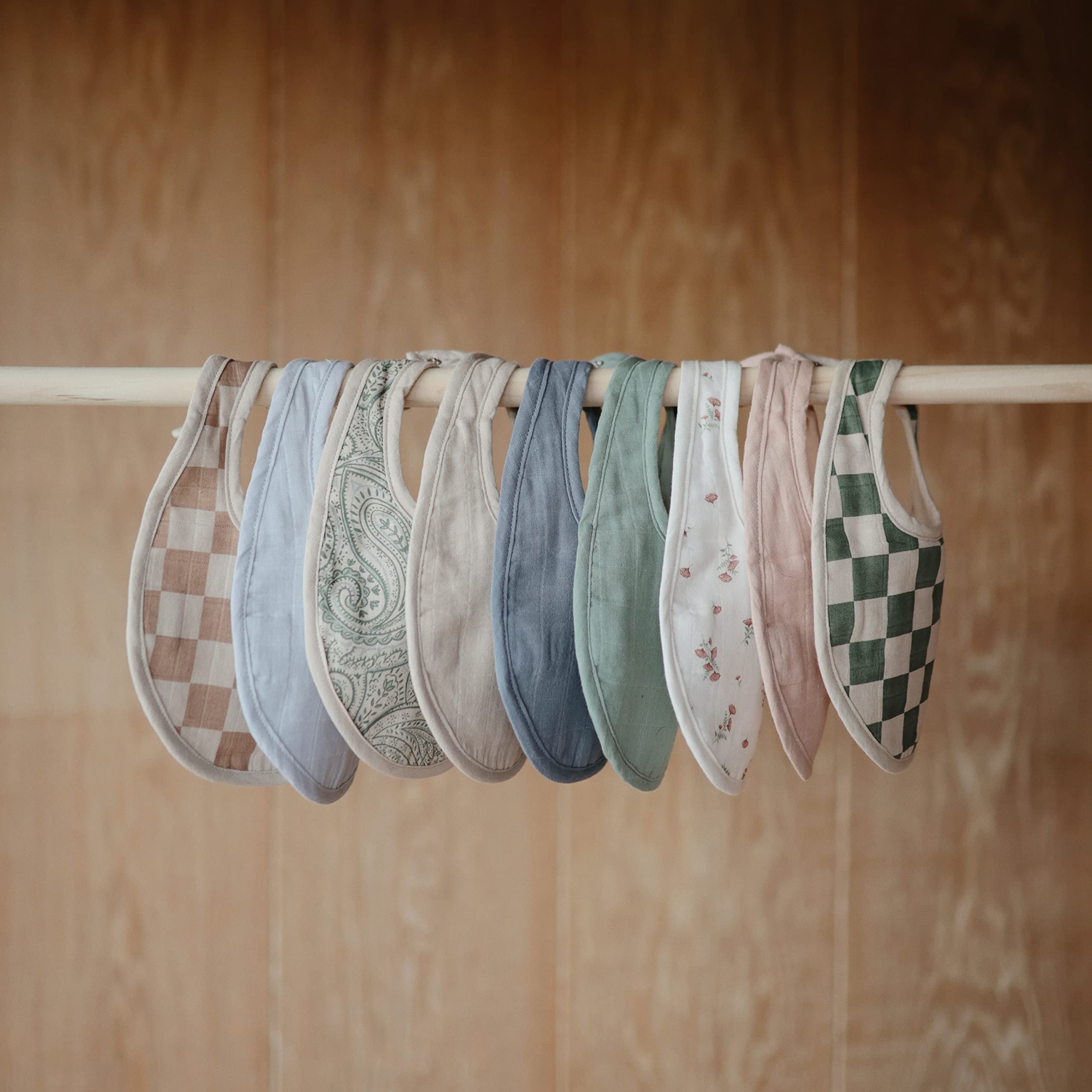 Mushie two-pack bibs simplify daily outfits and laundry routines.