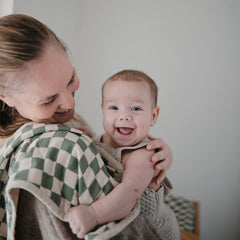 Mushie muslin burp cloth two-pack made of organic cotton, durable for mealtime and cleanup.