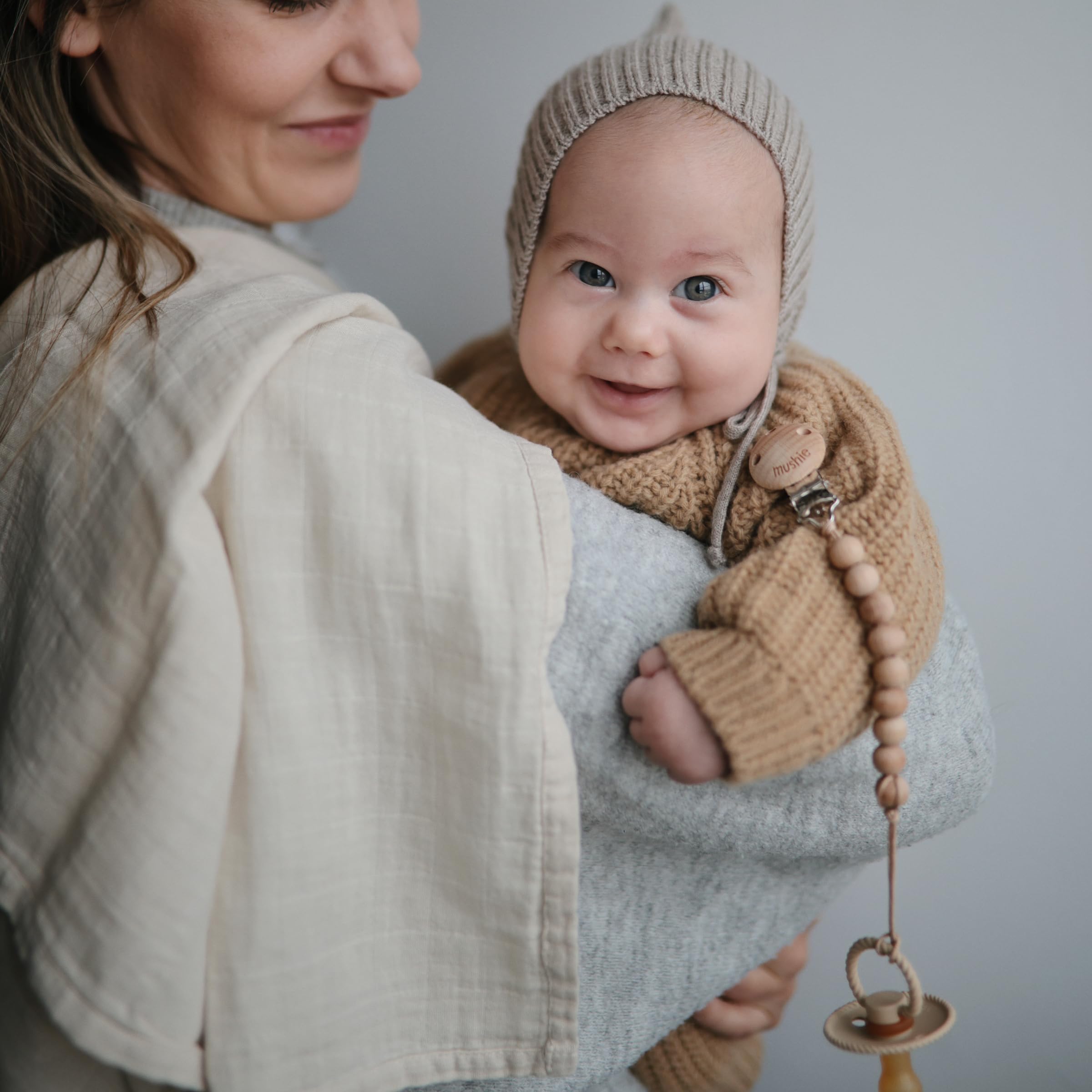 Mushie Muslin Cloth Fog clean-small-mess demonstrates versatile wipe-down utility