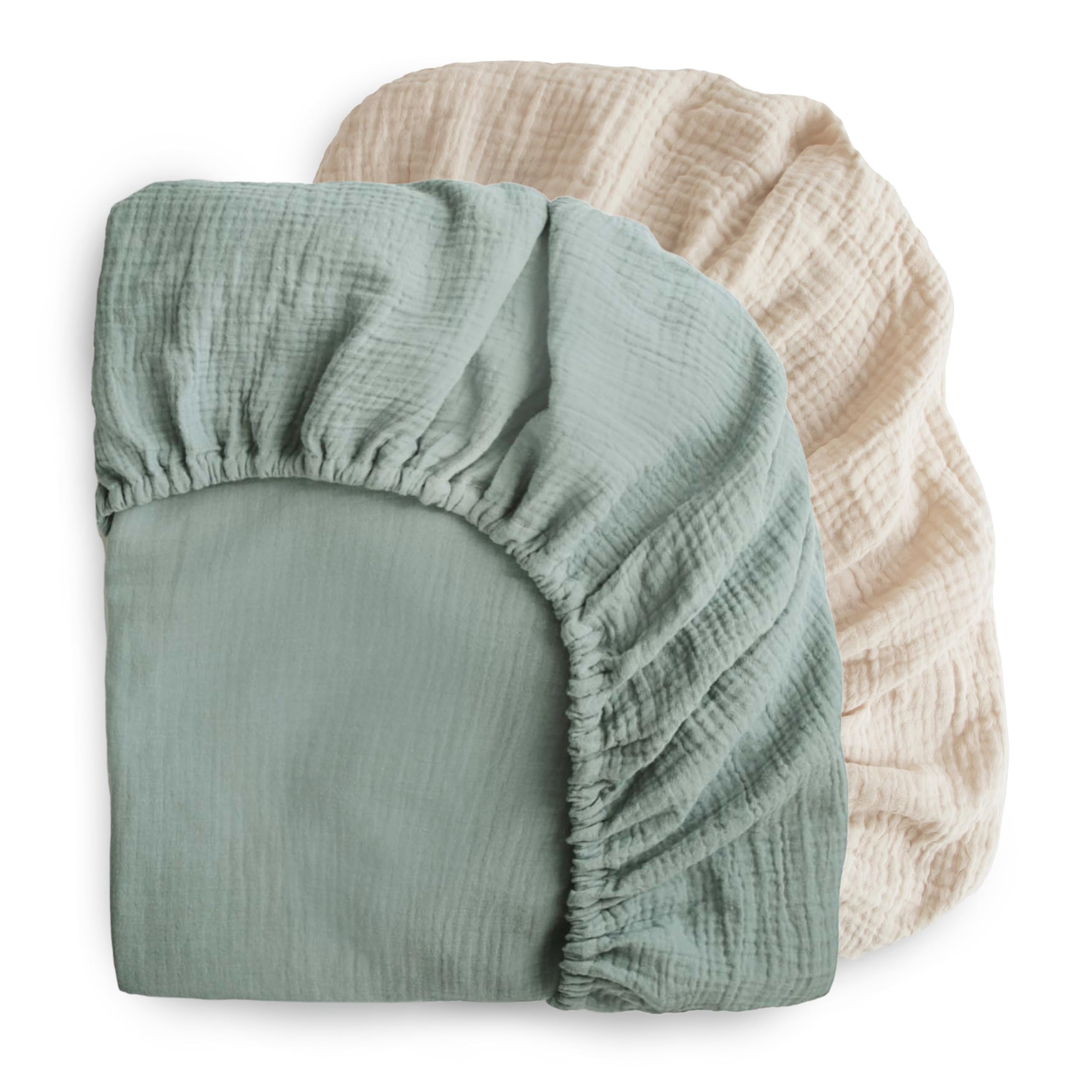 Mushie muslin crib sheet 2-pack offers breathable warmth and easy care.