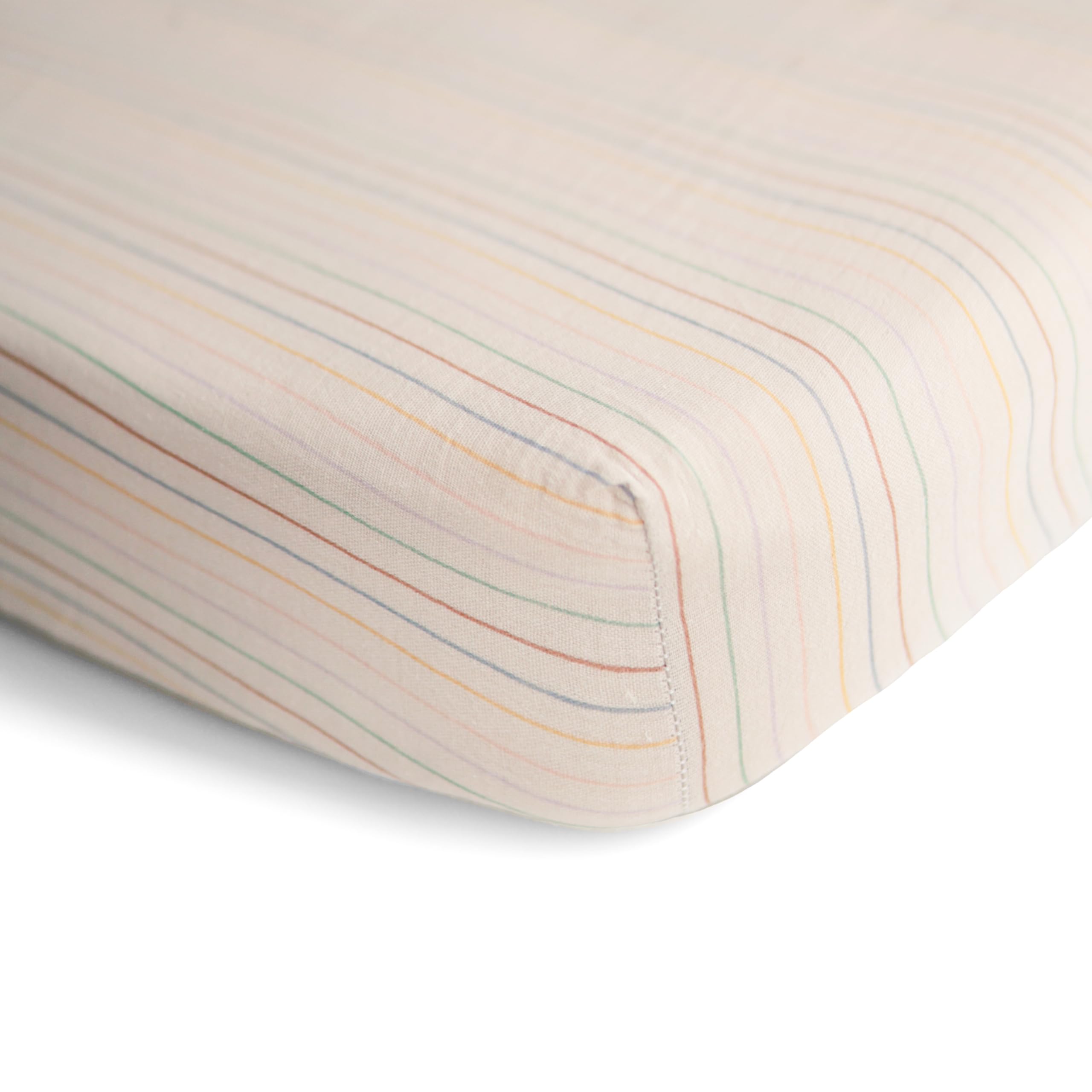 Mushie muslin crib sheet closeup shows soft fabric and breathable comfort
