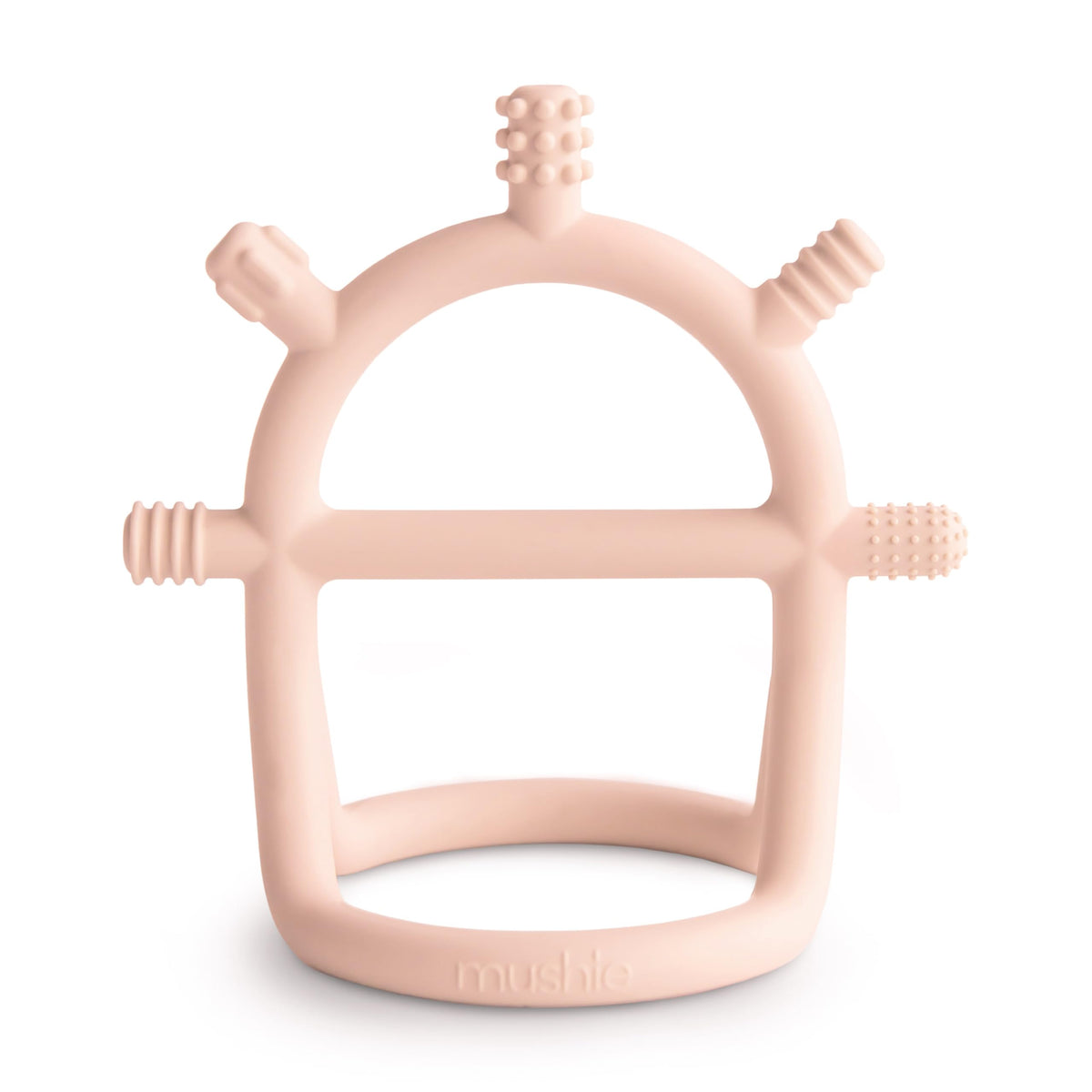 mushie No-Drop teether blush with easy grip handle for tiny hands