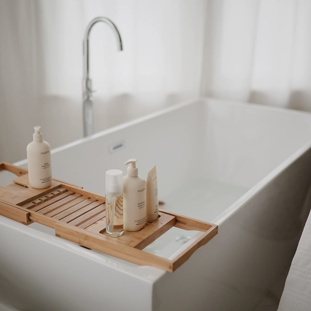 Mushie Organic Baby Oil after-bath use indicates easy absorption and moisture retention after bath time.