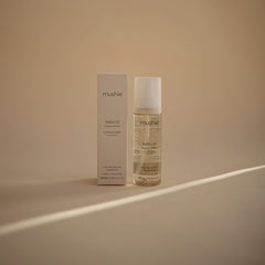 Mushie Organic Baby Oil ingredients COSMOS label highlights certified organic care for sensitive skin.